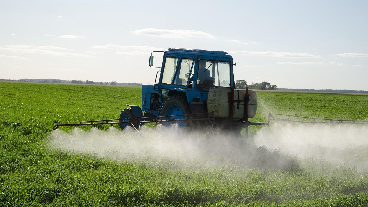 tractor pesticide field