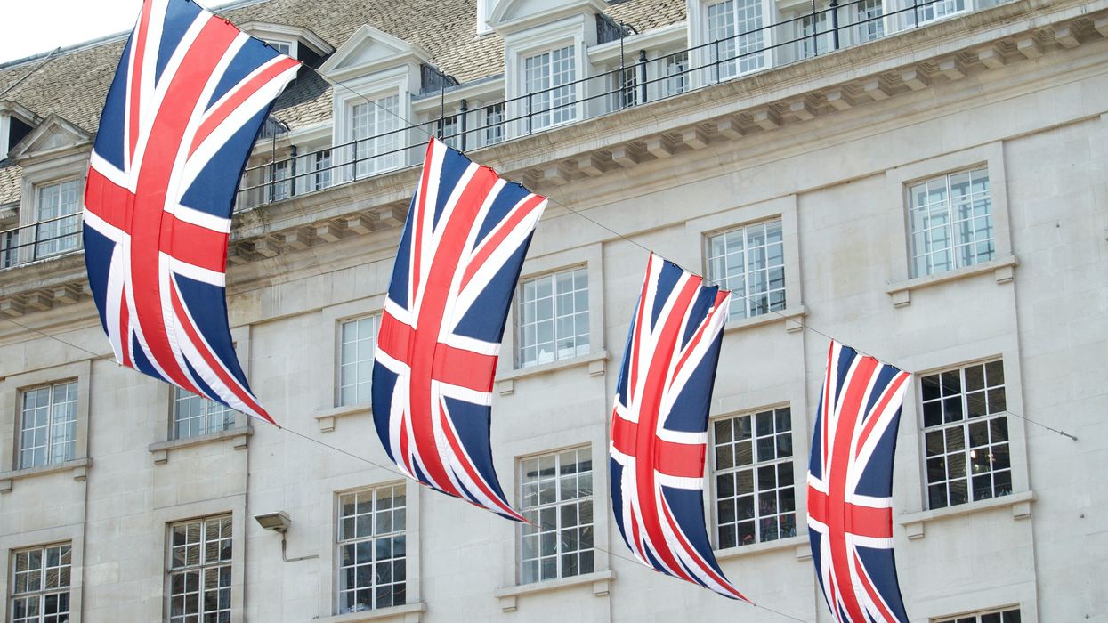 United Kingdom flags hung near a building