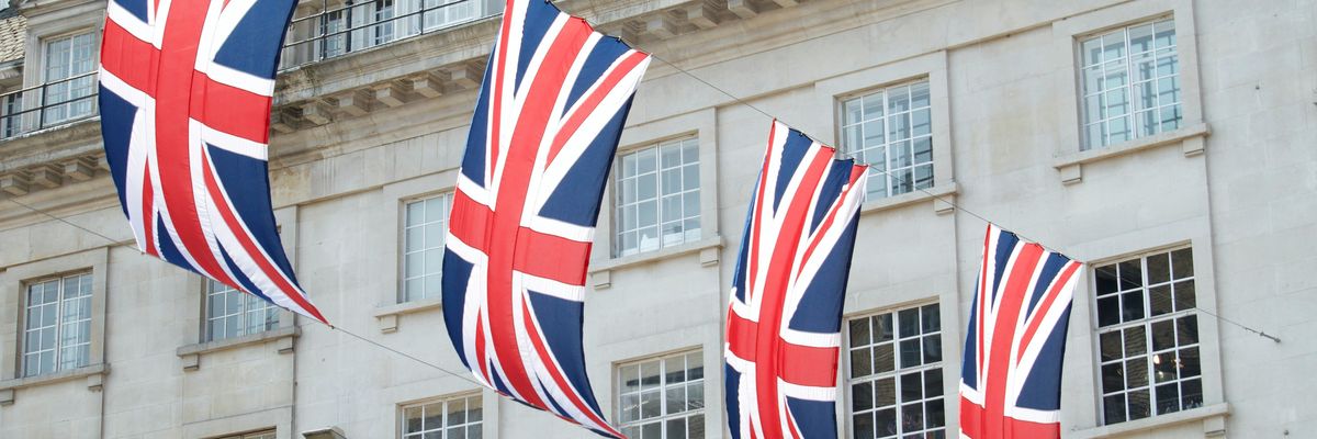 United Kingdom flags hung near a building